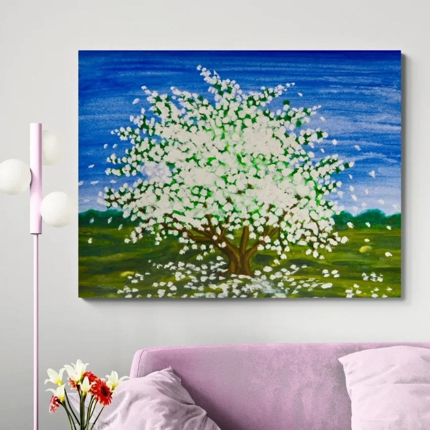 A modern abstract painting titled "Blossoming Beauty" of a vibrant tree in full white blossom against a bright blue sky on a canvas.