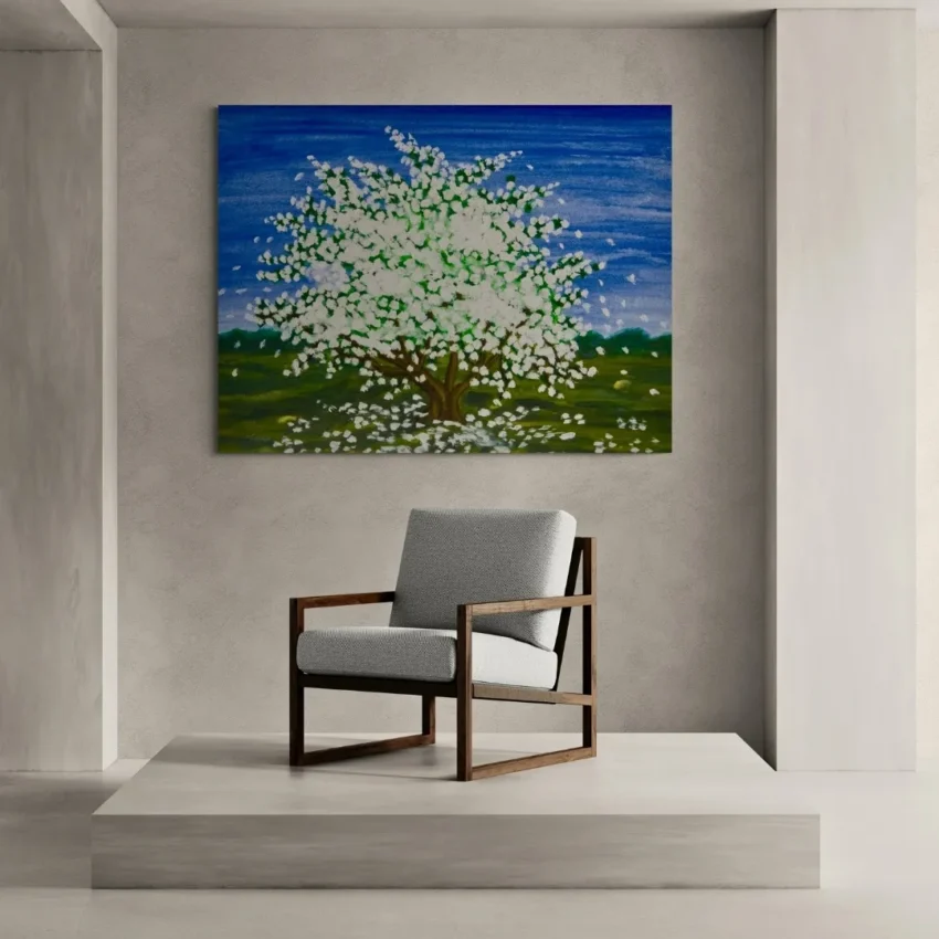 A modern abstract painting titled "Blossoming Beauty" of a vibrant tree in full white blossom against a bright blue sky on a canvas.