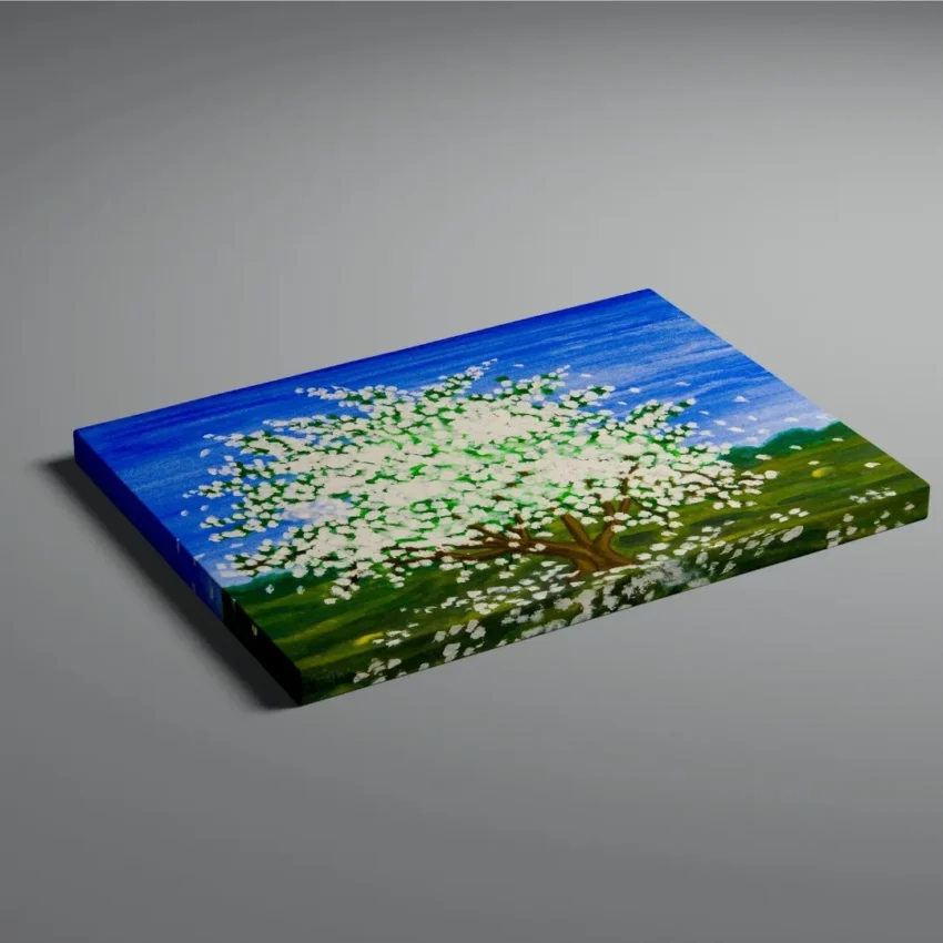A modern abstract painting titled "Blossoming Beauty" of a vibrant tree in full white blossom against a bright blue sky on a canvas.