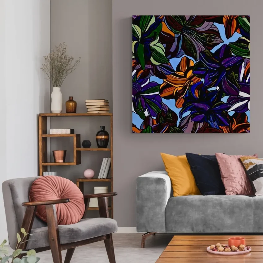 A vibrant, abstract painting of stylized colourful flowers with bold black outlines and a light blue background in a modern wall frame.