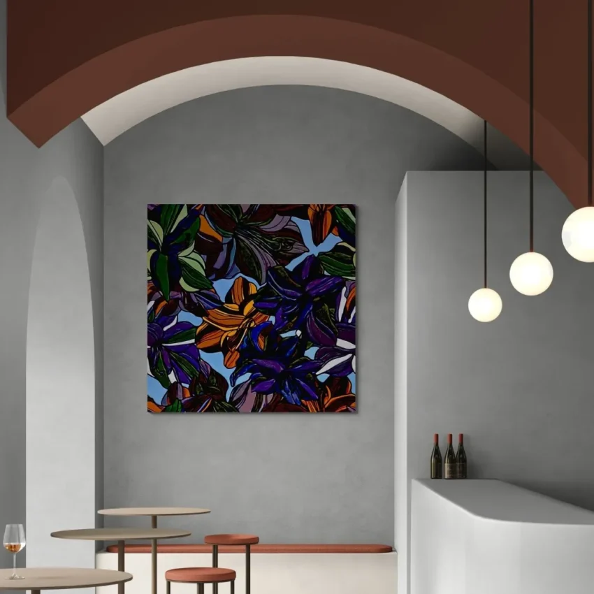 A vibrant, abstract painting of stylized colourful flowers with bold black outlines and a light blue background in a modern wall frame.