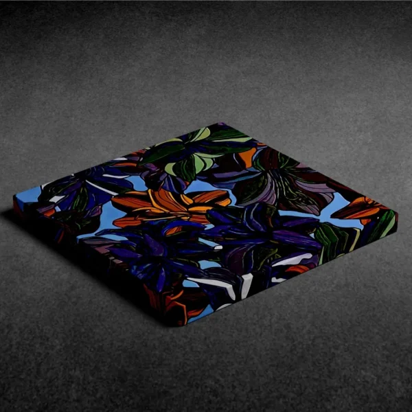 A vibrant, abstract painting of stylized colourful flowers with bold black outlines and a light blue background in a modern wall frame.