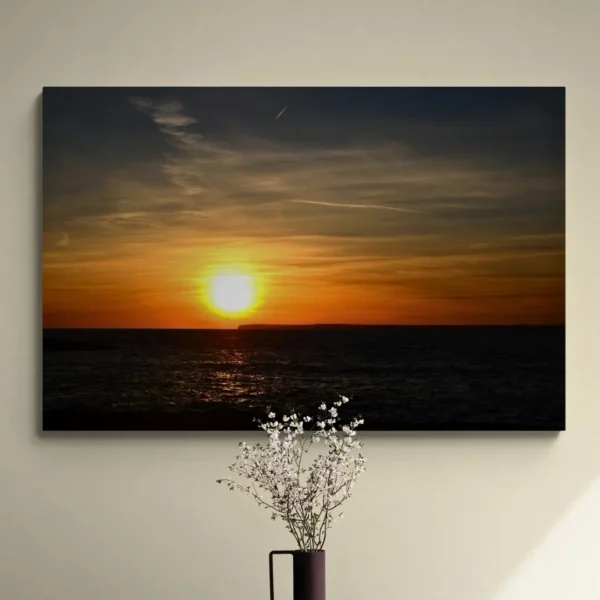 Nature-themed canvas wall art of a painting titled "Golden Serenity" capturing a timeless sunset over the ocean.