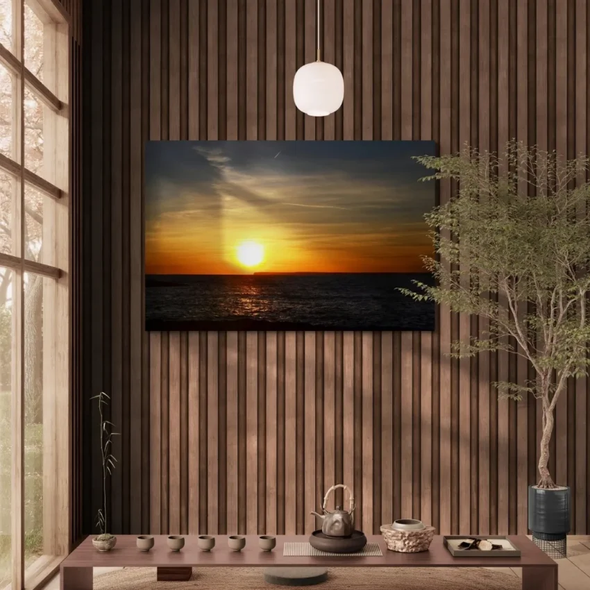 Nature-themed canvas wall art of a painting titled "Golden Serenity" capturing a timeless sunset over the ocean.