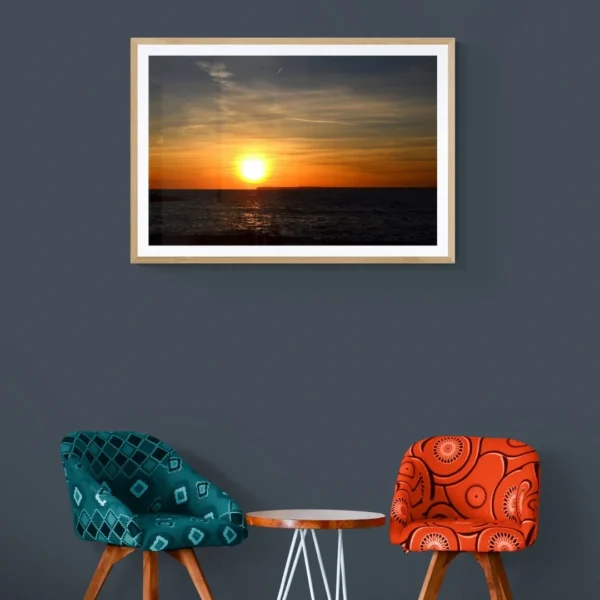 Nature-themed canvas wall art of a painting titled "Golden Serenity" capturing a timeless sunset over the ocean.