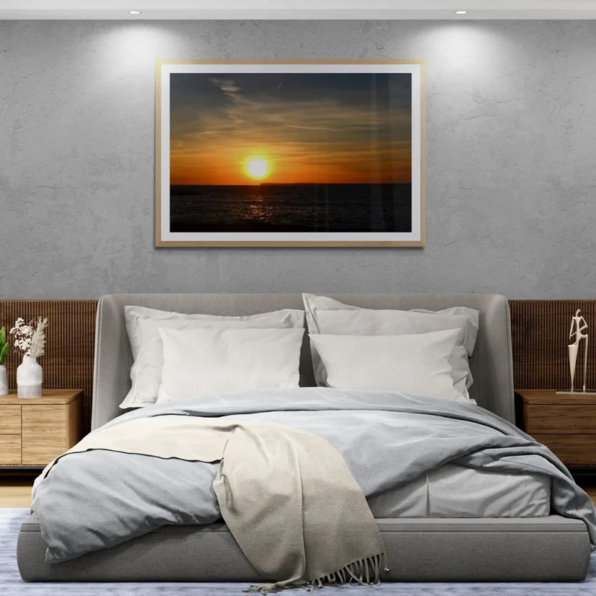 Nature-themed canvas wall art of a painting titled "Golden Serenity" capturing a timeless sunset over the ocean.