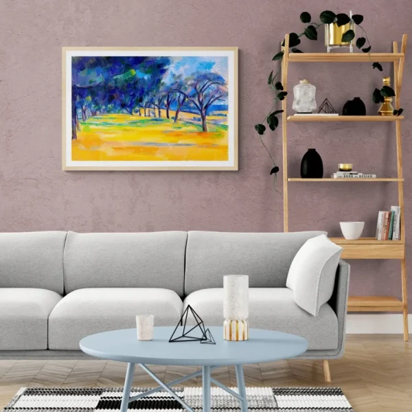 A framed wall art painting titled "Path Through the Golden Woods" showing a scenic path through blue and green trees with bright yellow grass.
