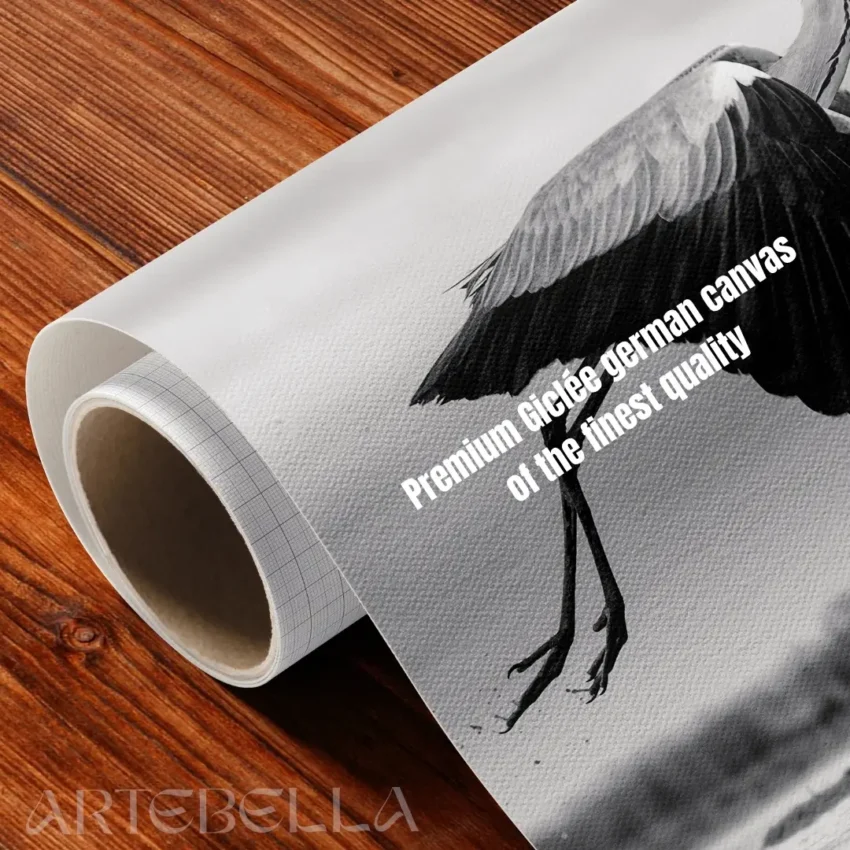 Nature-themed canvas wall art showing a heron with its wings spread in mid-flight over water.