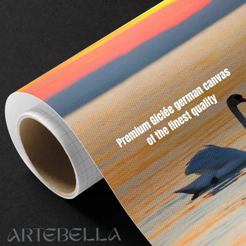 Nature-themed gallery wraps canvas wall art of a serene white swan gliding on calm water during a vibrant orange and gold sunset capturing a peaceful and elegant atmosphere.