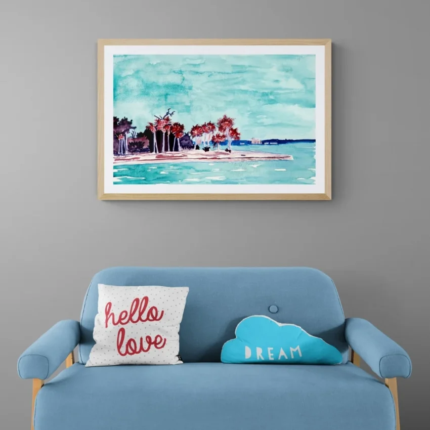 A watercolour painting wall art titled "Tranquil Shores" showing a peaceful coastal landscape with green trees, blue water, and a calm, turquoise sky.