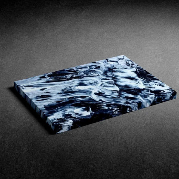 A modern, blue and white abstract painting titled "Rhythms of Fluidity" with swirling patterns, displayed as a canvas print on a wall.