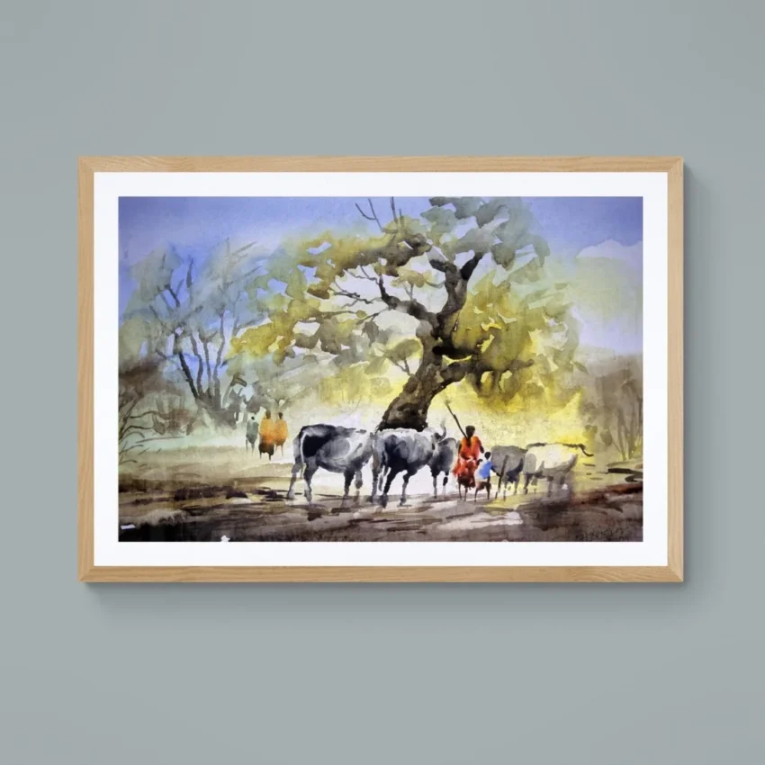 A framed painting titled "Rural Serenity" showing cattle and villagers resting under a large banyan tree in a peaceful countryside scene.