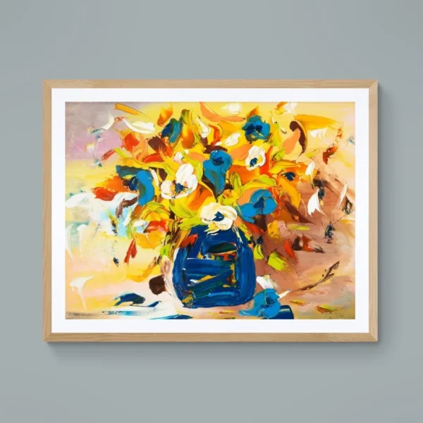 A modern, expressive painting titled "Colourful Harmony" of a vibrant bouquet painting with lively brushstrokes, showing red, orange flowers in a bold blue vase, displayed as framed wall art.