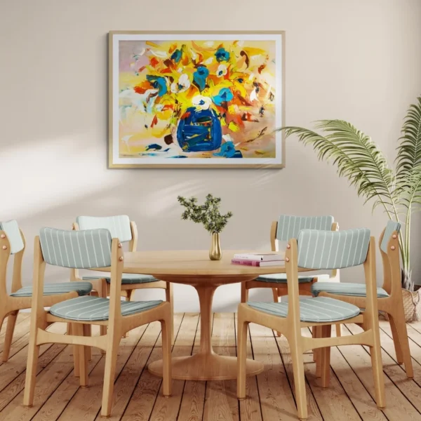 A modern, expressive painting titled "Colourful Harmony" of a vibrant bouquet painting with lively brushstrokes, showing red, orange flowers in a bold blue vase, displayed as framed wall art.